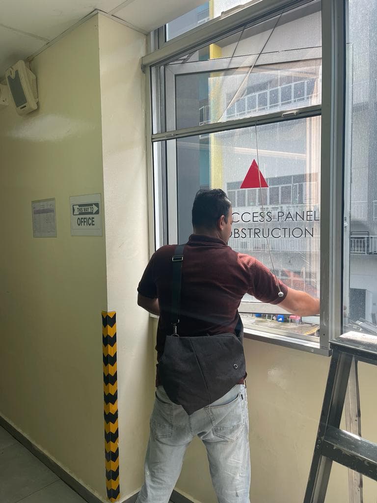 Replacing a broken window glass pane in a Singapore HDB kitchen