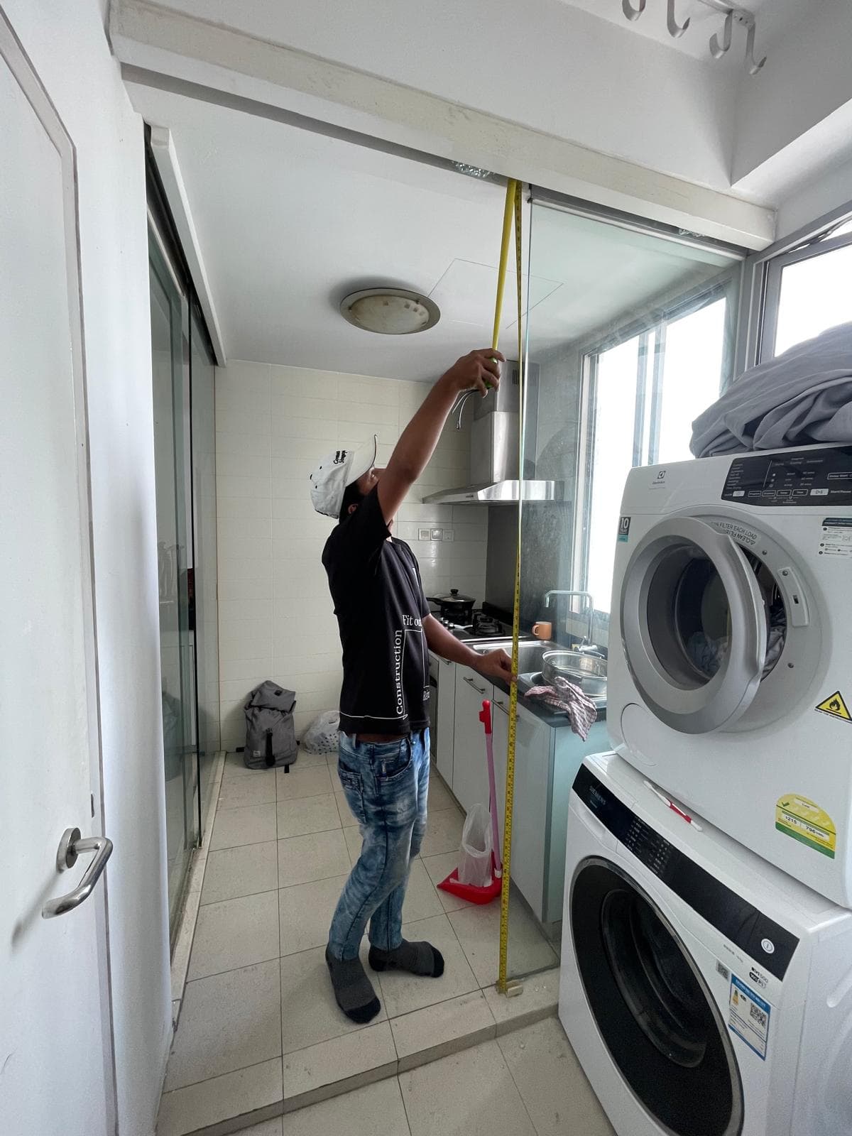 Before and after shower screen replacement in a HDB bathroom