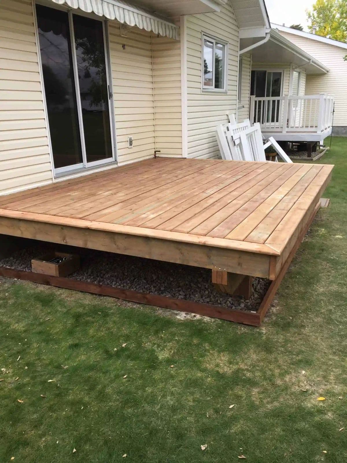 Building a wooden deck in a landed property backyard